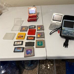 Nintendo Handheld Consoles Red and Silver